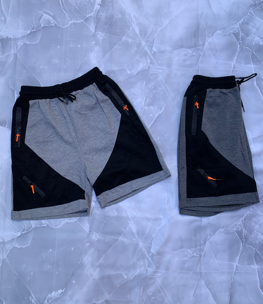 Shorts deportivos hombre bicolor gris y negro