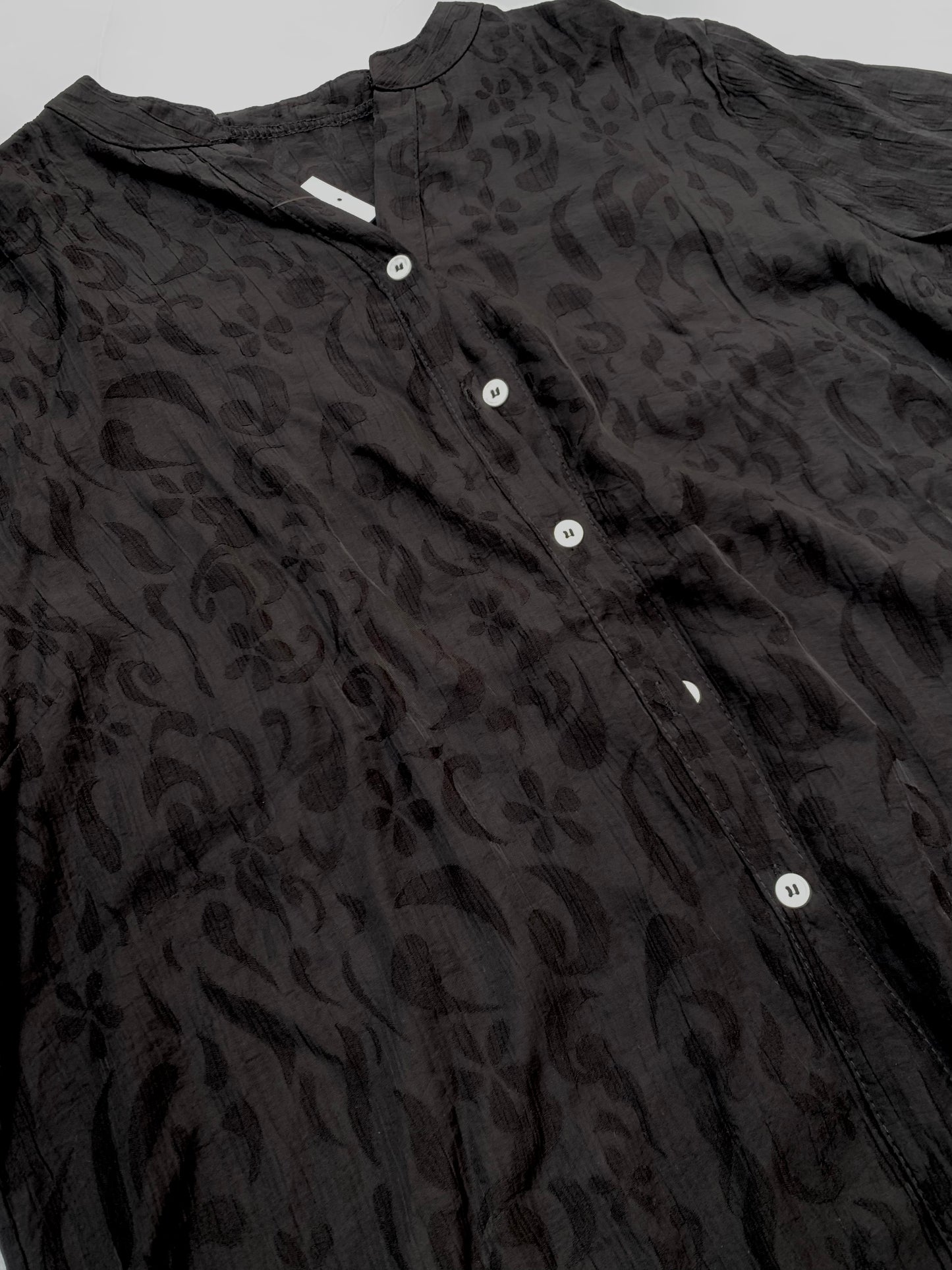 Blusa de lino jacquard en relieve — cuello mao