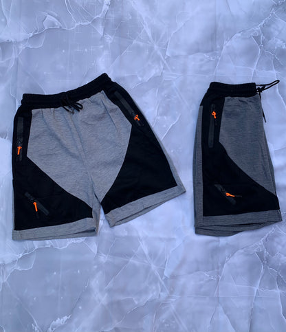 Shorts deportivos hombre bicolor gris y negro